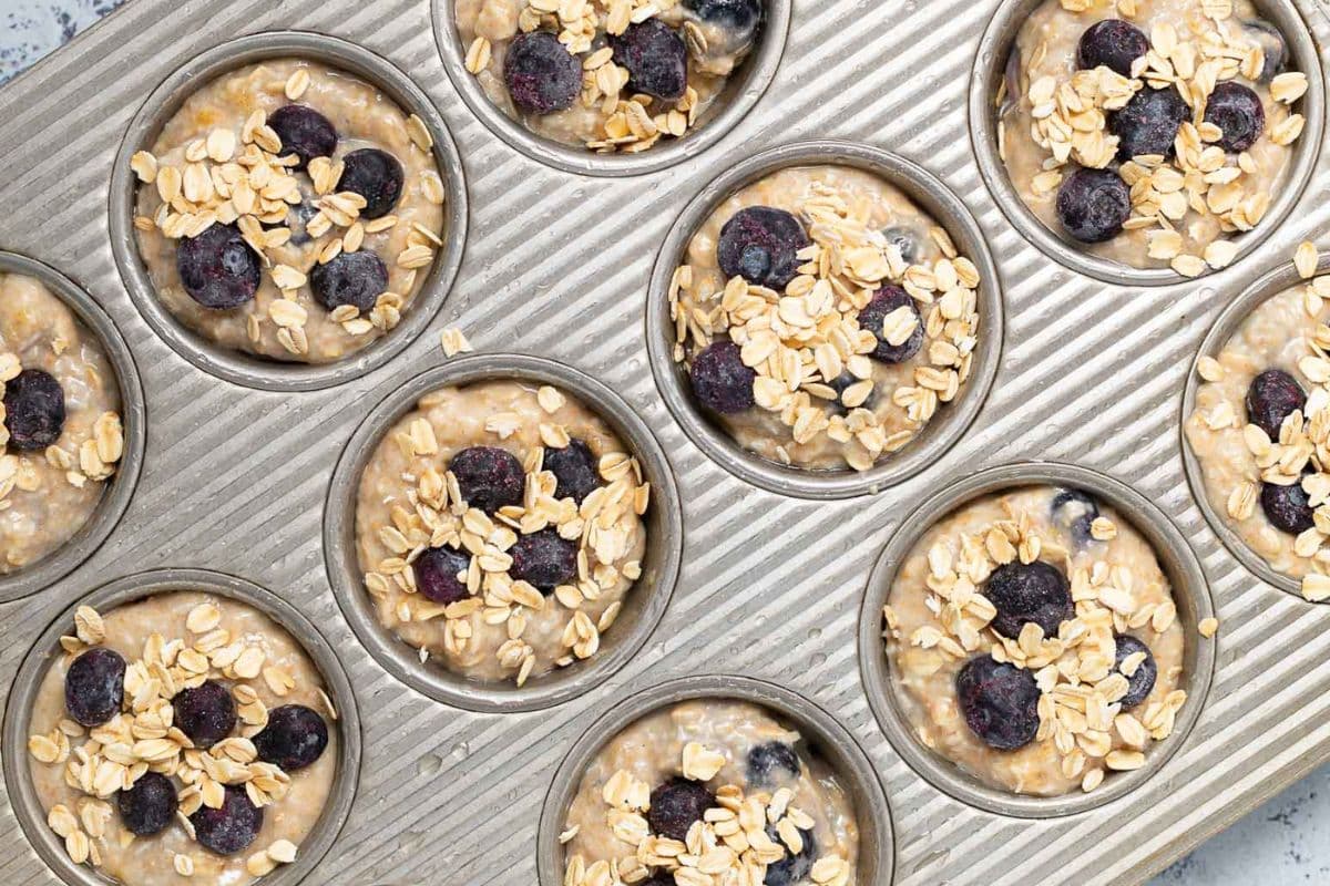 uncooked muffins in a pan