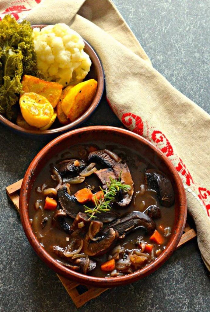 Rich and hearty Portobello Pot Roast. Meaty portobello mushrooms, red wine, herbs & vegetables combine to make a delicious plant-based feast.