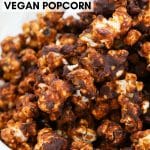 This vegan chocolate caramel popcorn is seriously addictive. Drenched in rich, buttery salted caramel, baked until perfectly crisp & then finished with lashings of chocolate, it is totally & utterly delicious & absolutely dairy free!