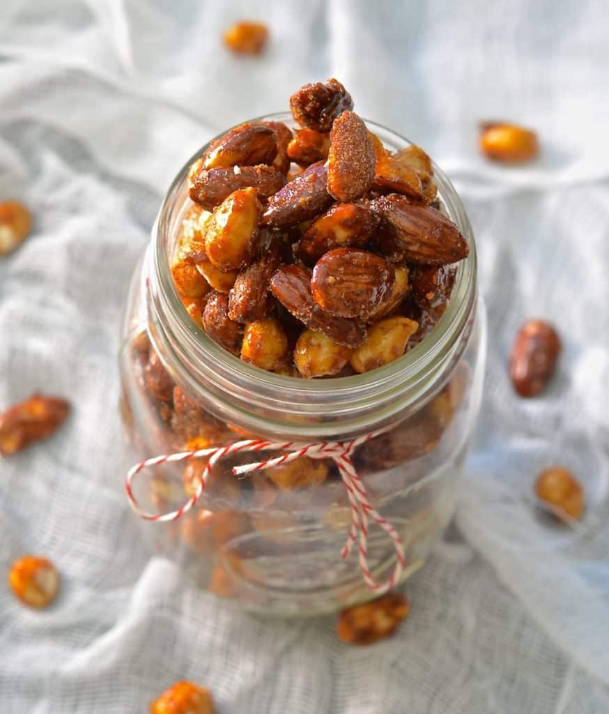 Perfectly sweet & spicy, chewy & crunchy vegan candied nuts. Make a double batch because everybody will go nuts for these!
