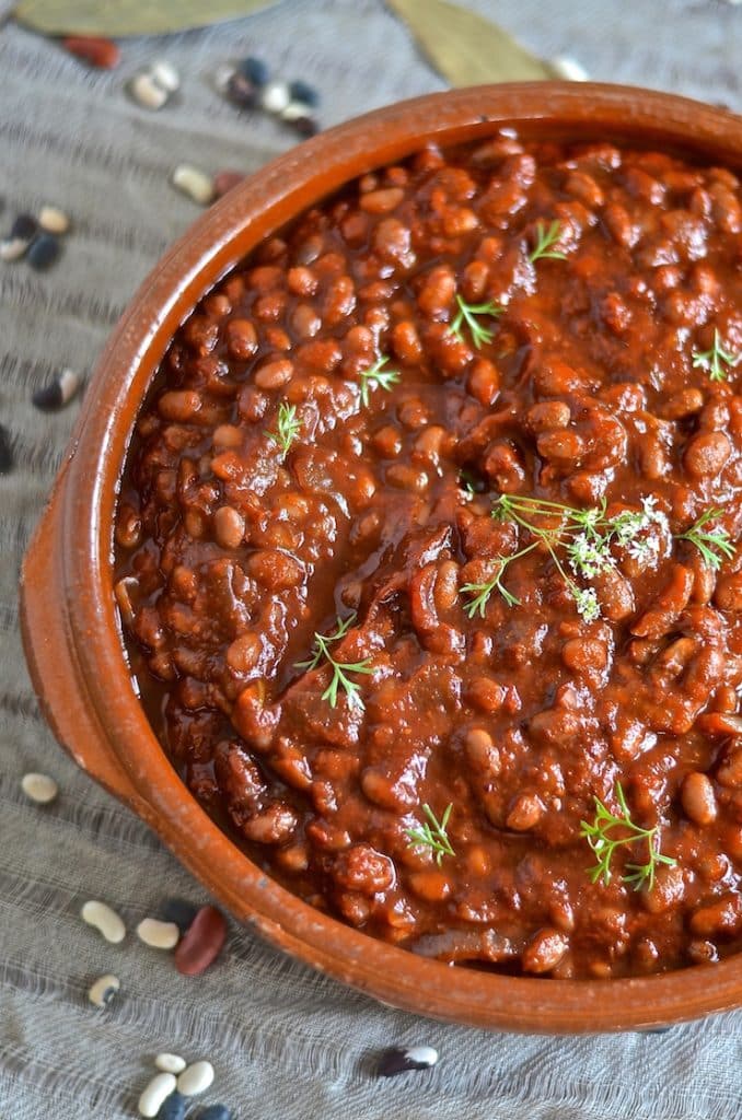 These thick, sweet & smoky slow cooked vegan baked beans need a little initial prep then you can leave them to do their thing while you do yours. You will be rewarded with a comforting & delicious pot of the most amazing baked beans with rich, deep & complex flavours.