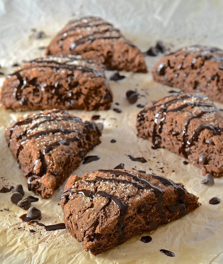 These double chocolate scones might be healthier than traditional versions but I promise there is no sacrifice in taste. Rich, dark, chocolatey & delicious with a tender cocoa enhanced crumb studded with chocolate chunks, they will satisfy the worst chocolate cravings!