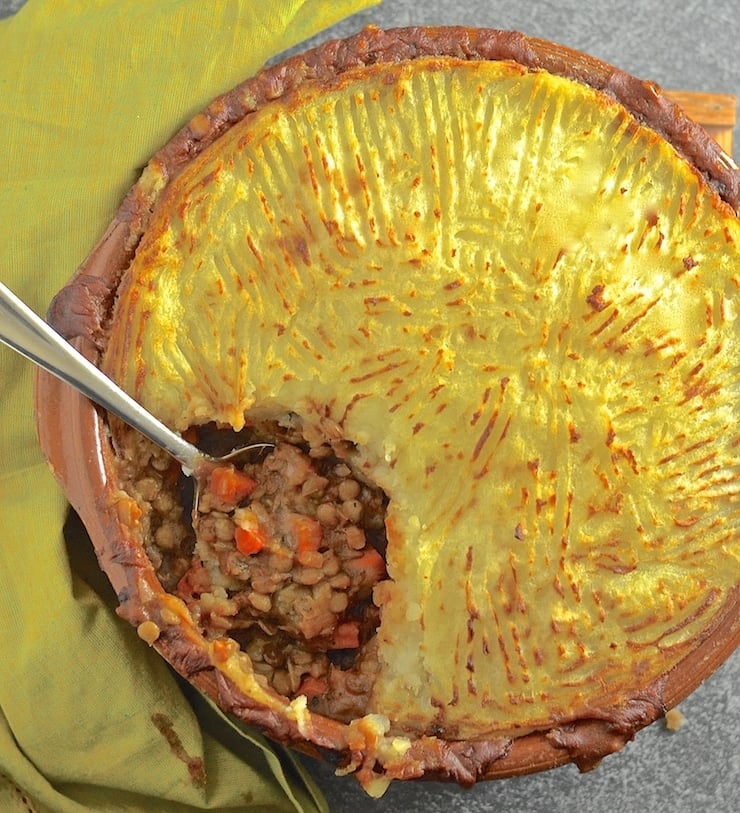 Rich, flavourful, saucy lentils topped with fluffy, creamy mashed potatoes & baked until deliciously golden brown & crispy. The ultimate vegan shepherd's pie!