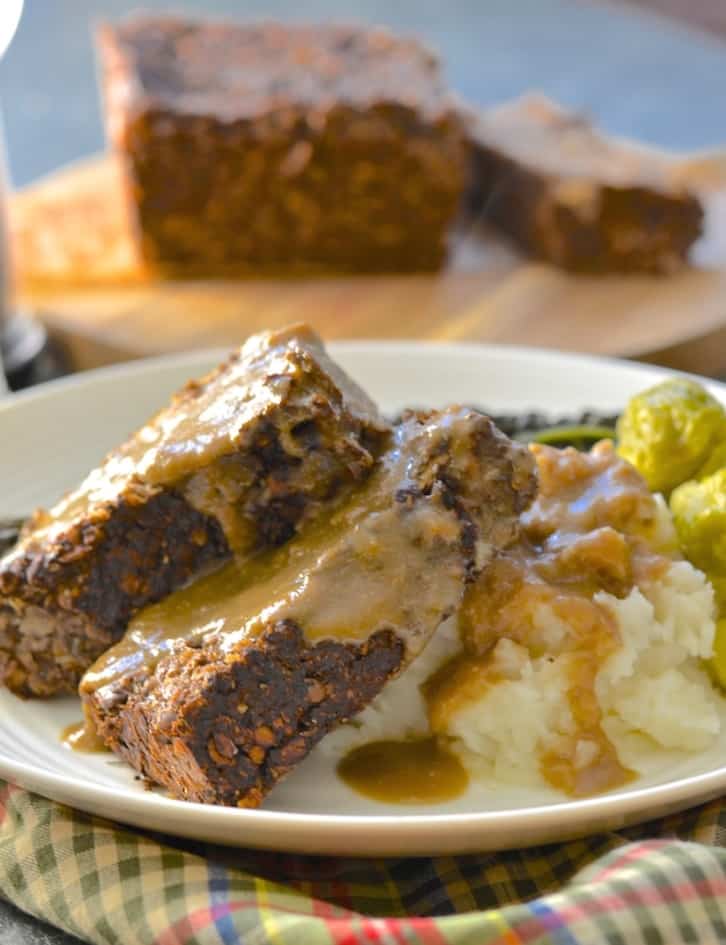 This vegan meatloaf is incredibly easy to make & is sure to please with it's deep & savoury flavour. Serve sliced & smothered in rich, thick gravy for a truly satisfying meal!