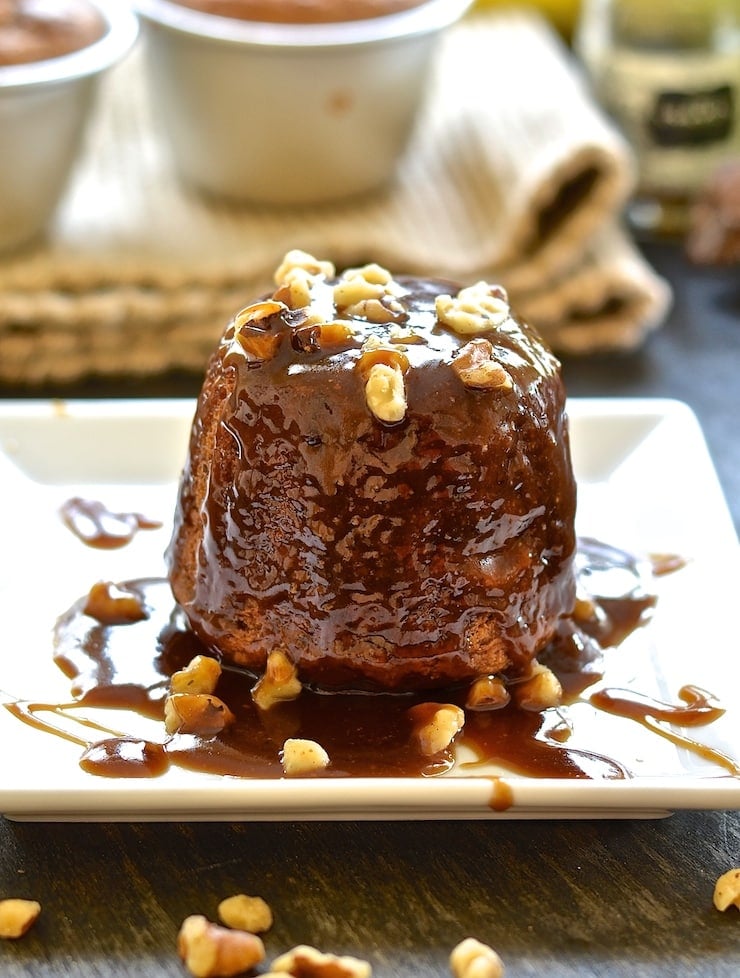 Sticky Date Banana Pudding drizzled in rum caramel and sprinkled with walnuts. 