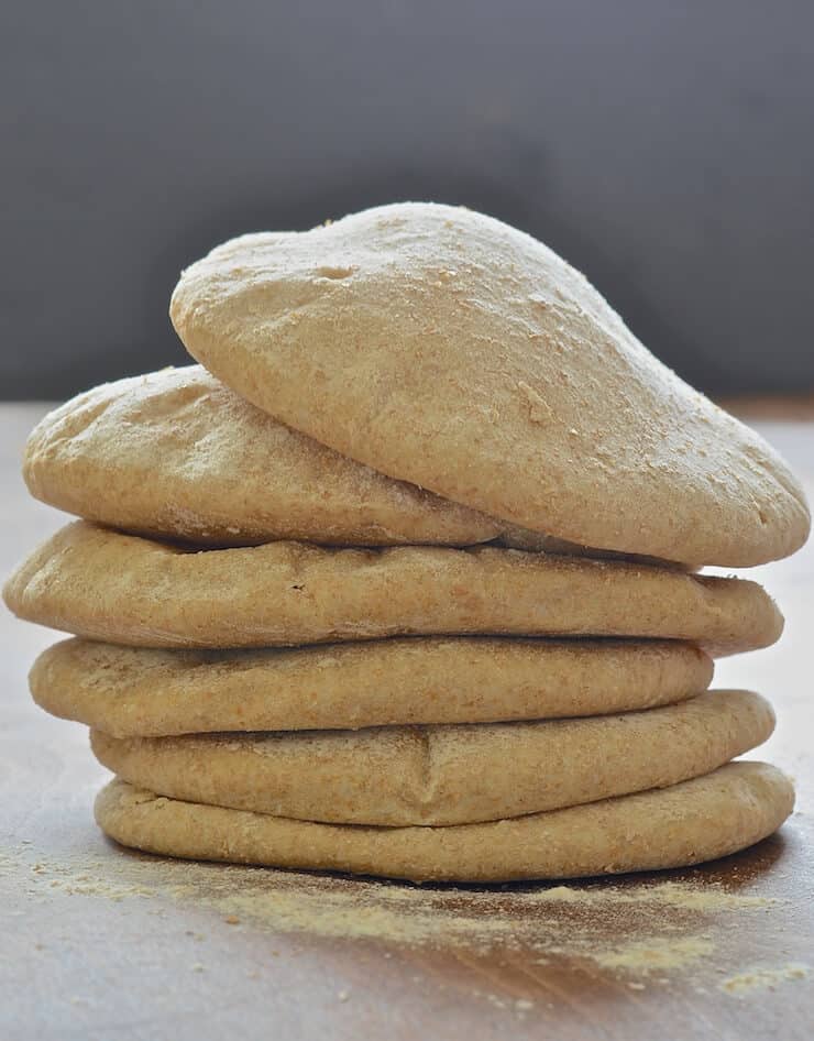 a stack of fluffy homemade pita bread
