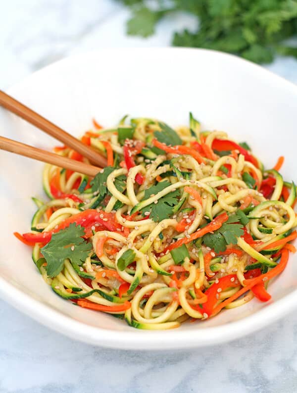 Summery, light, healthy & delicious Miso Zucchini Noodles. Ready from start to finish in under 15 minutes & no cooking required!