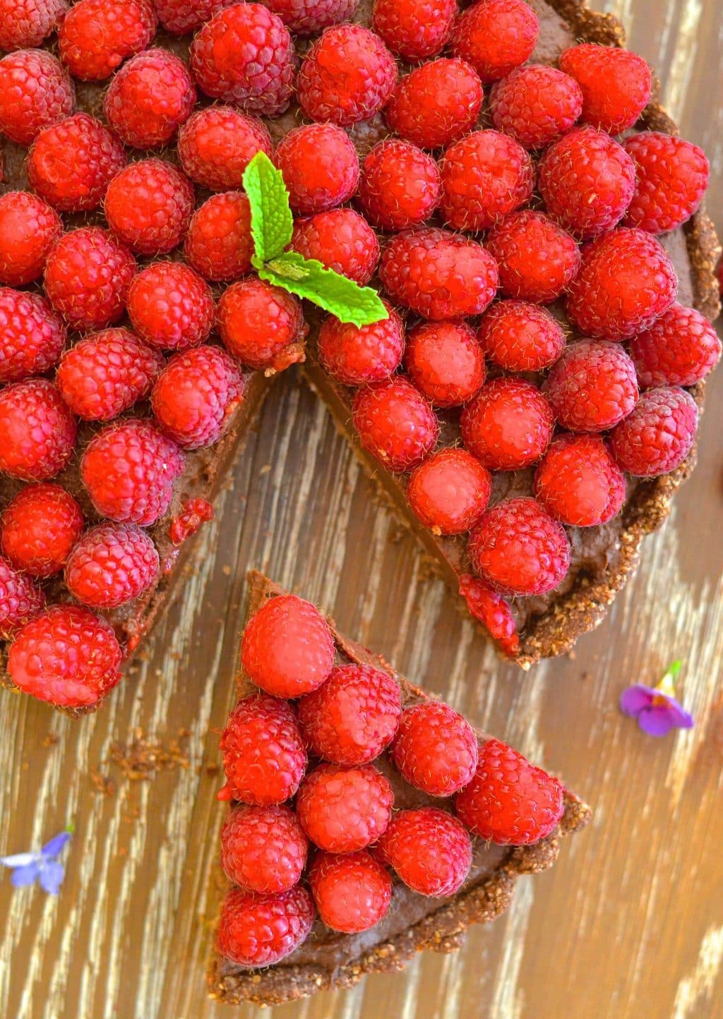 Want a dessert that looks and tastes decadent but is secretly quite good for you? I've got you covered with my Healthy Raspberry Chocolate Fudge Tart!