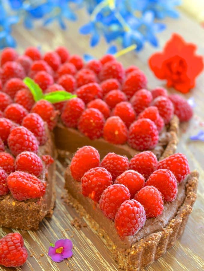 Want a dessert that looks and tastes decadent but is secretly quite good for you? I've got you covered with my Healthy Fudgy Chocolate Raspberry Tart!