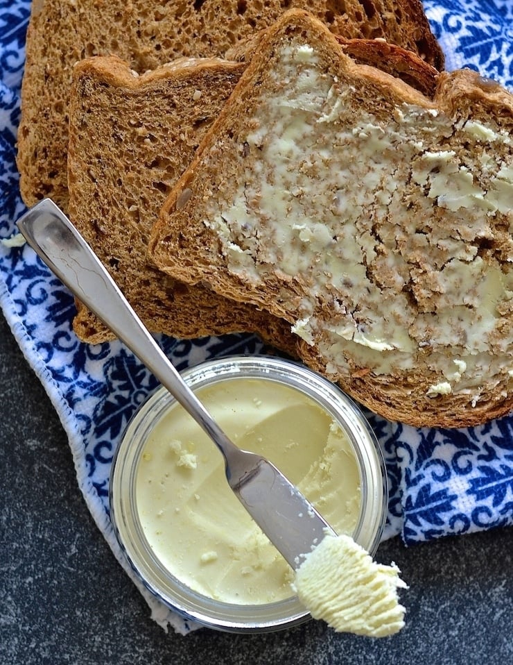 If you love butter but hate the ingredients in store bought dairy free versions then this recipe is the answer to your prayers. This easy homemade vegan butter is dreamily smooth, rich & creamy & can be whipped up in minutes. It is also palm oil & emulsifier free & can be used just like real butter!