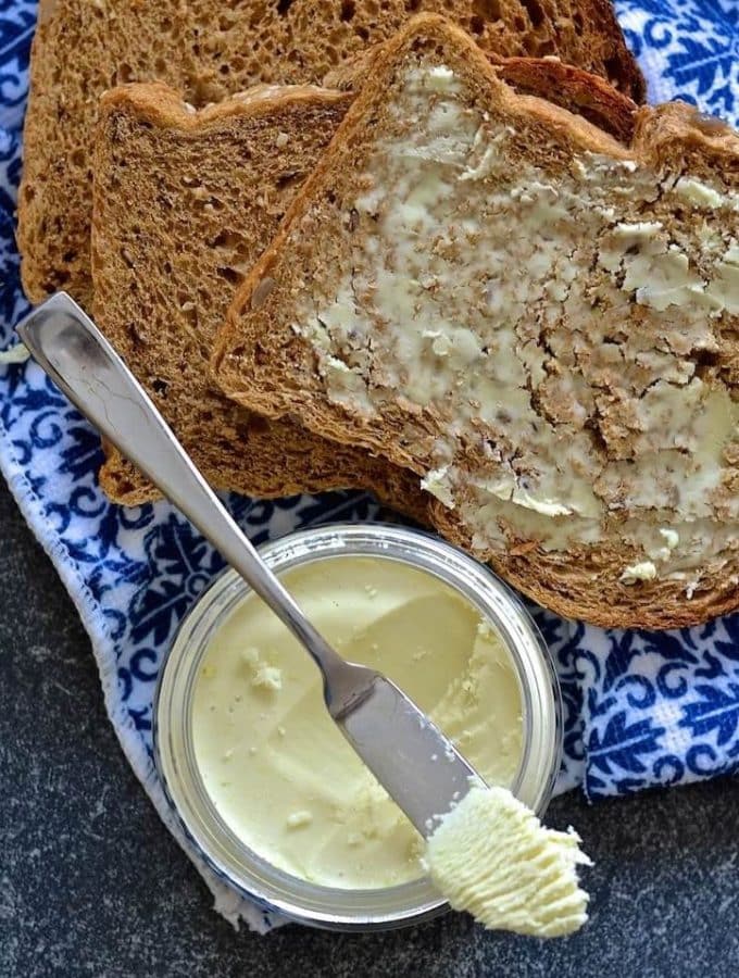 If you love butter but hate the ingredients in store bought dairy free versions then this recipe is the answer to your prayers. This easy homemade vegan butter is dreamily smooth, rich & creamy & can be whipped up in minutes. It is also palm oil & emulsifier free & can be used just like real butter!
