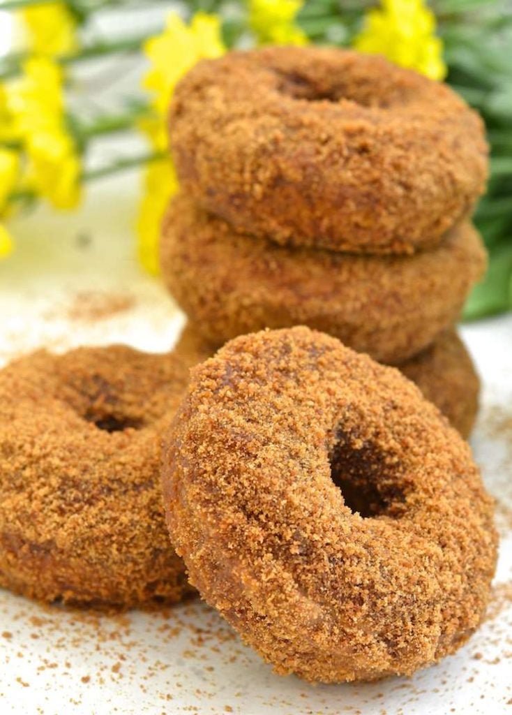 Moist, soft & fluffy, oil-free Pumpkin Orange Donuts. Baked to perfection then rolled in sugar. So easy to make & no mixer required! All you need is a spoon & a bowl. No donut pan? Don't worry, I've got you covered, but just so's you know....everything tastes better in donut shape! ;O) www.avirtualvegan.com
