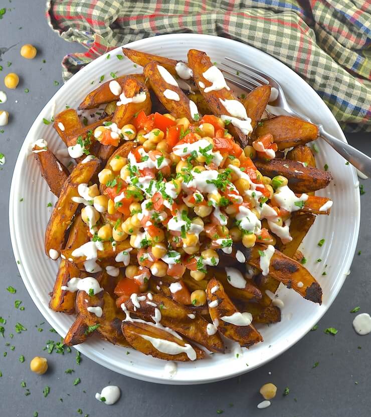 Loaded taco fries with drizzles of tasty crema!