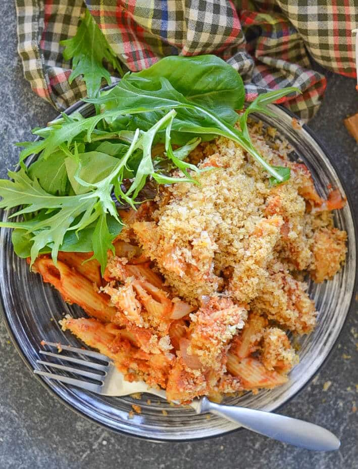 This Tomato Pasta Bake with Garlicky Crumb topping is a budget friendly, hearty & delicious meal that the whole family will love!