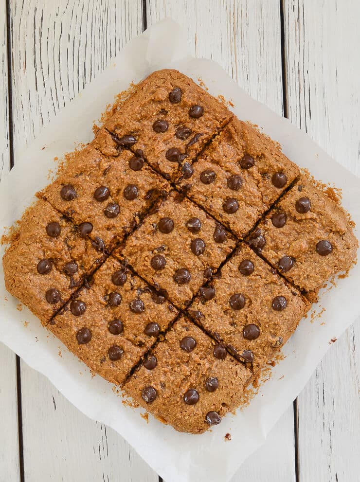 These Oatmeal Chocolate Chip Cookie Bars are perfectly soft & chewy, made healthier with oat flour & no oil, and they are absolutely delicious!