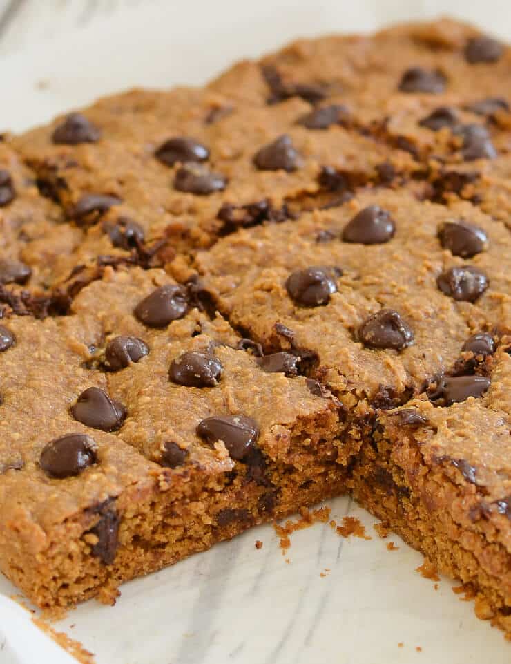 These Oatmeal Chocolate Chip Cookie Bars are perfectly soft & chewy, made healthier with oat flour & no oil, and they are absolutely delicious!