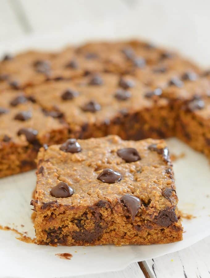 These Oatmeal Chocolate Chip Cookie Bars are perfectly soft & chewy, made healthier with oat flour & no oil, and they are absolutely delicious!