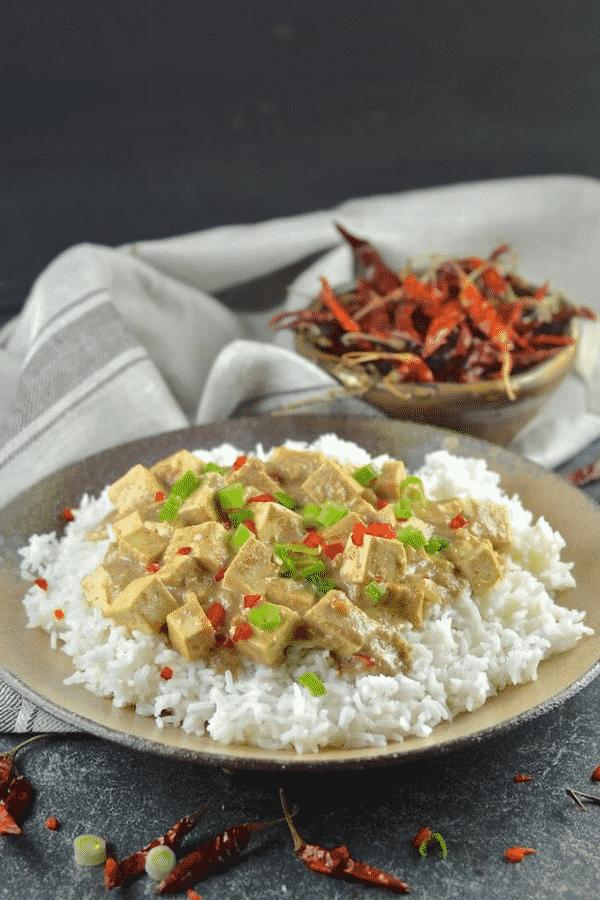 Tender tofu in a rich, smooth and creamy satay sauce. This Tofu Satay is super easy to prepare & tastes totally delicious! #tofu #satay #vegan #tofusatay #vegetarian