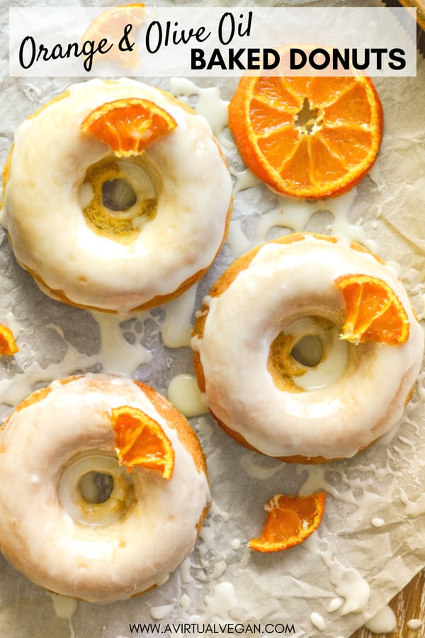Light, fluffy and incredibly moist, these Orange Olive Oil Baked Donuts are a real taste sensation. The pungent, fruity oil balances perfectly with the orange & the sticky glaze finishes them off perfectly! #donuts #doughnuts #vegandonuts #vegan #orange #oliveoil #veganrecipe