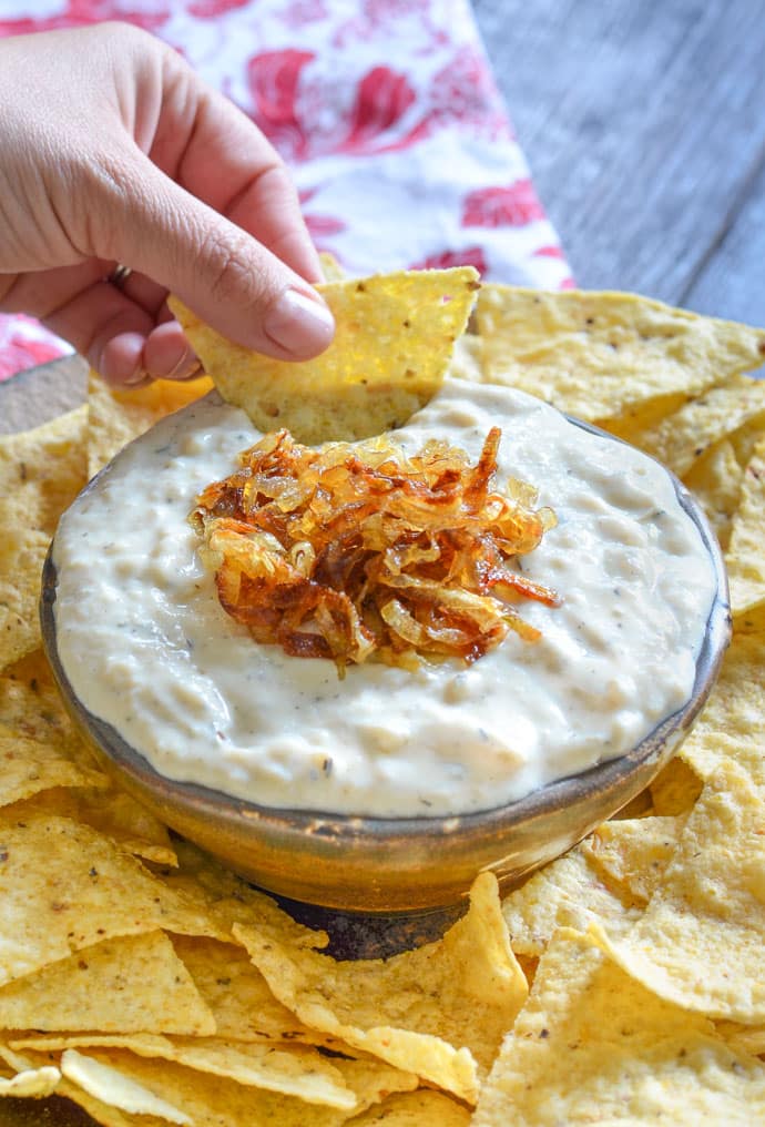 A deliciously cool, creamy & nut-free vegan Onion Garlic Dip. Full of sweet roasted garlic & caramelized onion flavour & perfect for your next party!