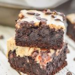 Cheesecake Topped Fudgy Chocolate Brownies stacked