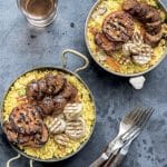 Vegan Paella with trumpet mushrooms, spicy sausage and tomatoes