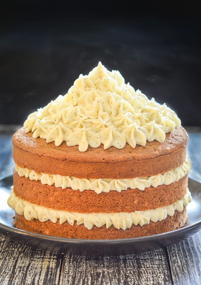 Layered Earl Grey Vegan Cake with swirls of lemon frosting