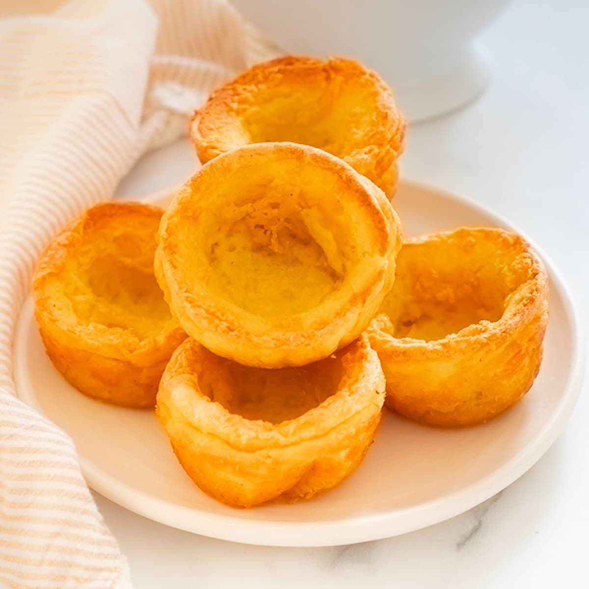 a plate of vegan Yorkshire puddings