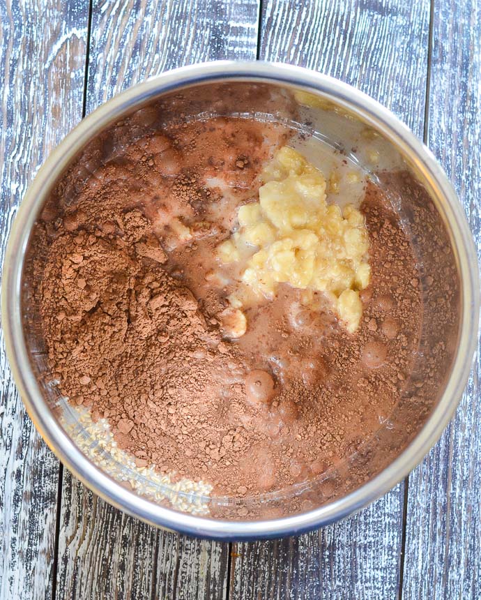 All ingredients for Healthy Chocolate Instant Pot Steel Cut Oats inside the Instant Pot before cooking
