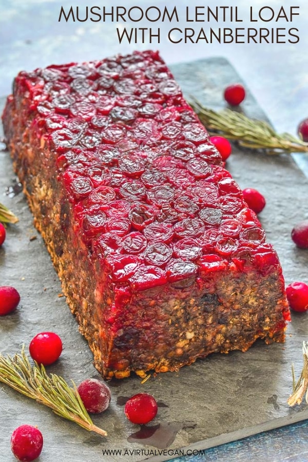 A fresh take on a Vegan Lentil Loaf for you! It's made with a delicious blend of lentils, mushrooms and walnuts and has a beautifully festive cranberry topping. Those pops of juicy cranberry in every bite are so good, plus they make it look pretty impressive. It would make a great centrepiece on your holiday table! #vegan #lentilloaf #veganmeatloaf #Christmas #Thanksgiving #vegetarian