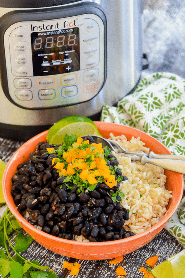 My Instant Pot Seasoned Black Beans Recipe makes a simple, tasty, healthy & budget friendly dinner. It's also perfect for batch cooking as the beans are great used as a base for other meals! #blackbeans #instantpot #pressurecooker #driedbeans #beans #healthy #vegan #vegetarian