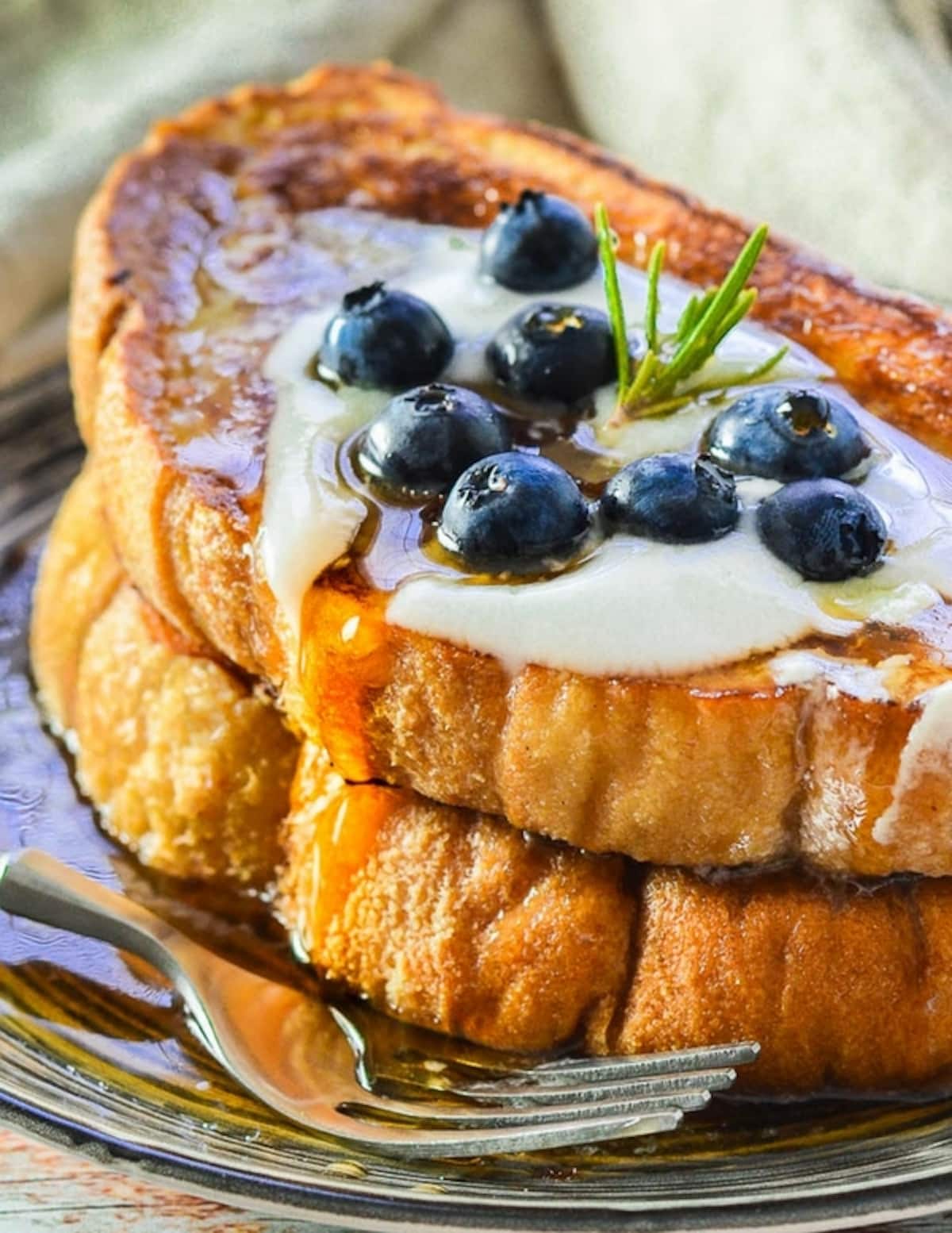 a close up of a pile of French Toast 