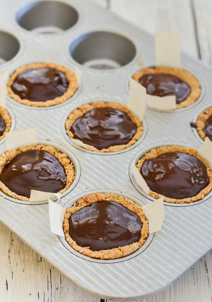 Healthier Chocolate Caramel Cookie Cups in a muffin pan
