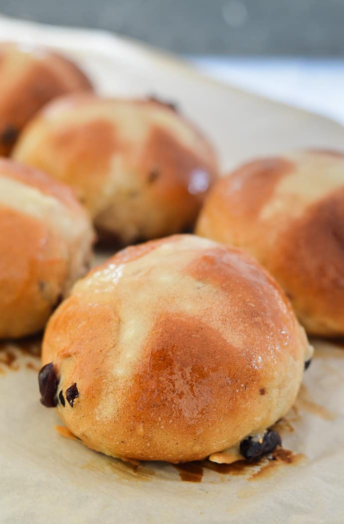 close up shot of freshly baked vegan hot cross buns