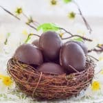 Vegan Caramel Eggs nestled in a faux bird's nest