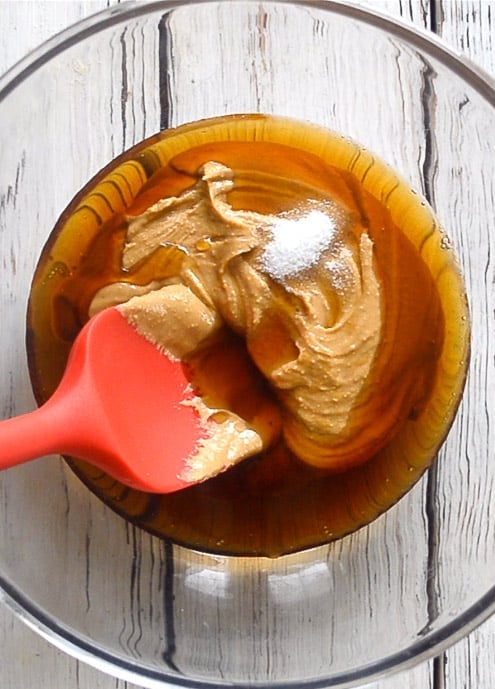 cashew butter, maple syrup and salt in a bowl ready to make vegan fudge