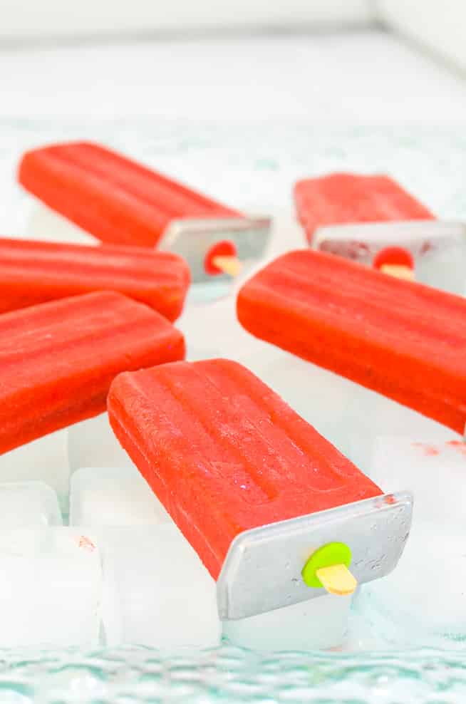 homemade strawberry popsicles on ice
