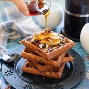Toasty, golden, crunchy Banana Waffles are in your breakfasting future and they couldn't be simpler to make because you can whip the batter up in your blender!