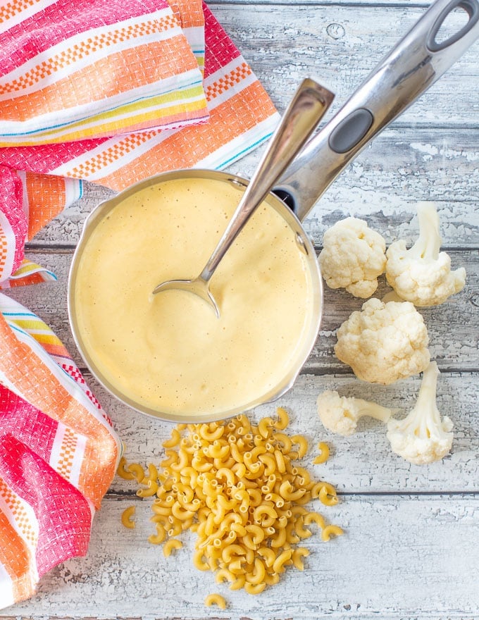 Vegan Cheese Sauce in a small stainless steel pan