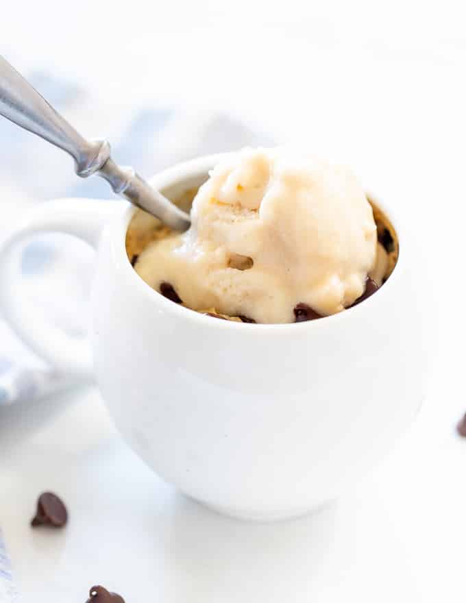chocolate chip cookie in a mug with ice cream 