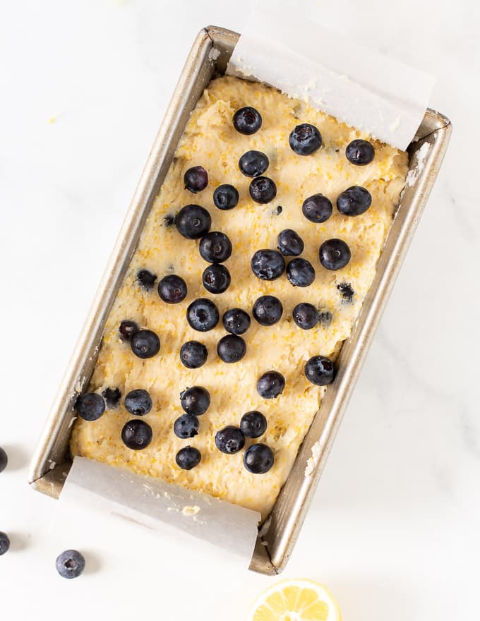 uncooked lemon blueberry loaf in loaf pan