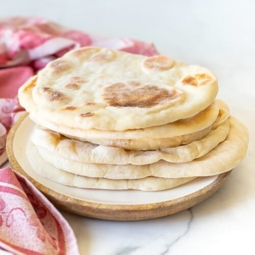 a stack of flatbreads on a plate