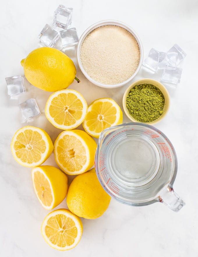 ingredients for Matcha Lemonade laid out on white background