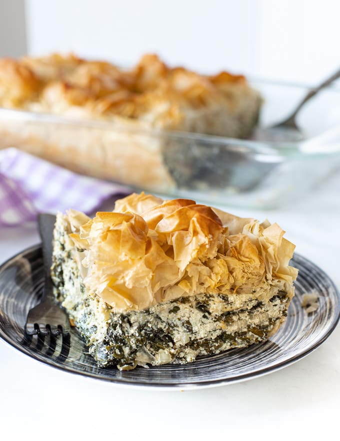 a slice of vegan spanakopita on a plate