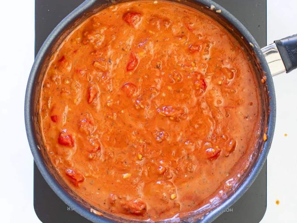 creamy cherry tomato sauce in a pan