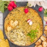 Warm, soft, rich and creamy Vegan Spinach Artichoke Dip. Chock full of spinach and briny, zesty artichokes and full of flavour. Just perfect for serving on game day or at parties, or for indulging in on a treat yo’self kind of night! Amazing served warm but also good at room temperature.