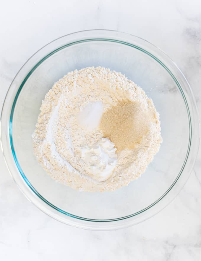 flour, salt and baking powder in a bowl ready to make a giant blueberry vegan pancake
