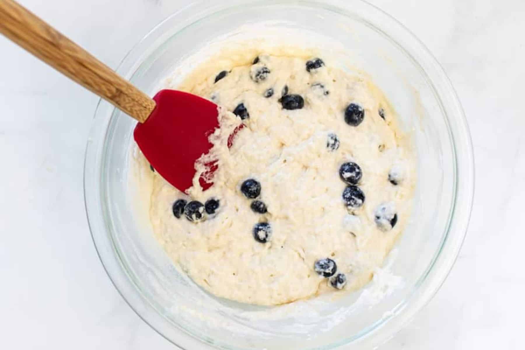 blueberry pancake batter in a mixing bowl