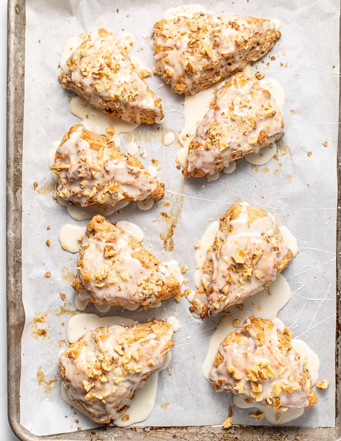 vegan banana scones with maple glaze and nuts on a baking tray