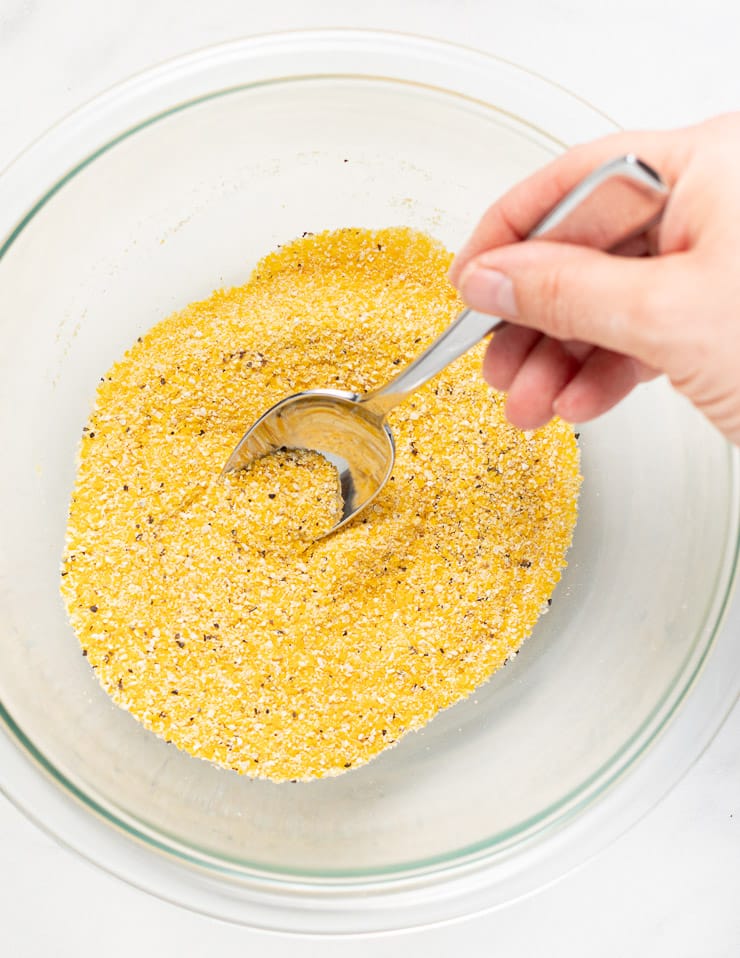 cornmeal mixed with salt and black pepper in a bowl